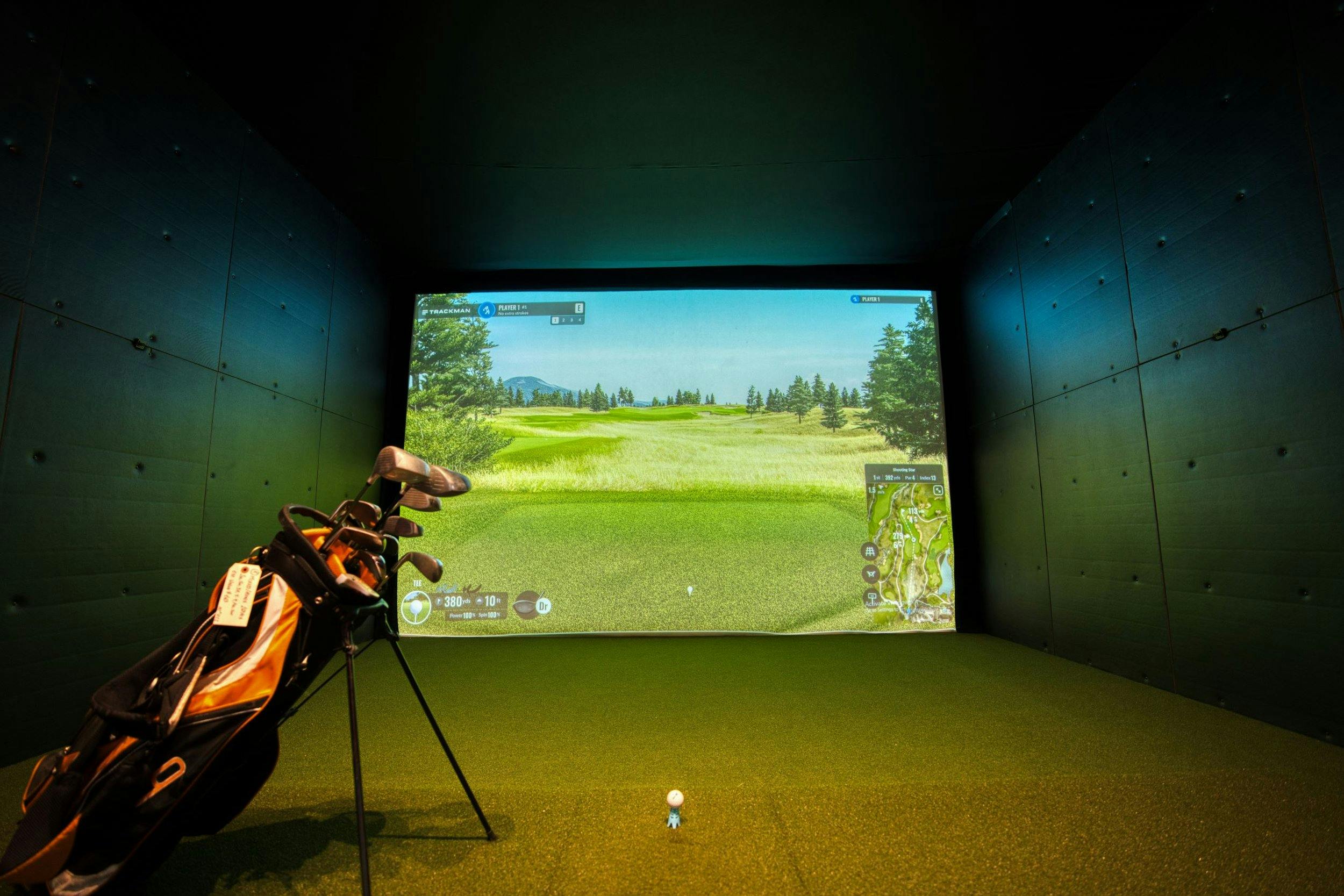 Indoor golf simulator representing year-round golf in Frisco TX