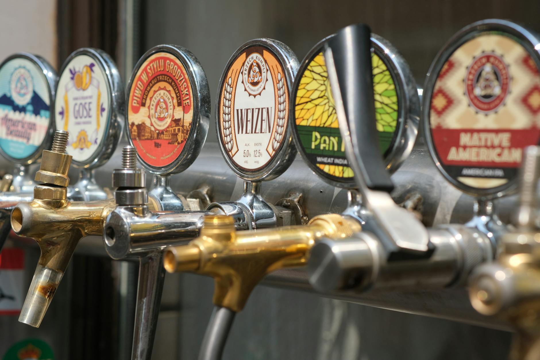 Craft brewery beer taps at restaurants in Frisco TX featuring local brews