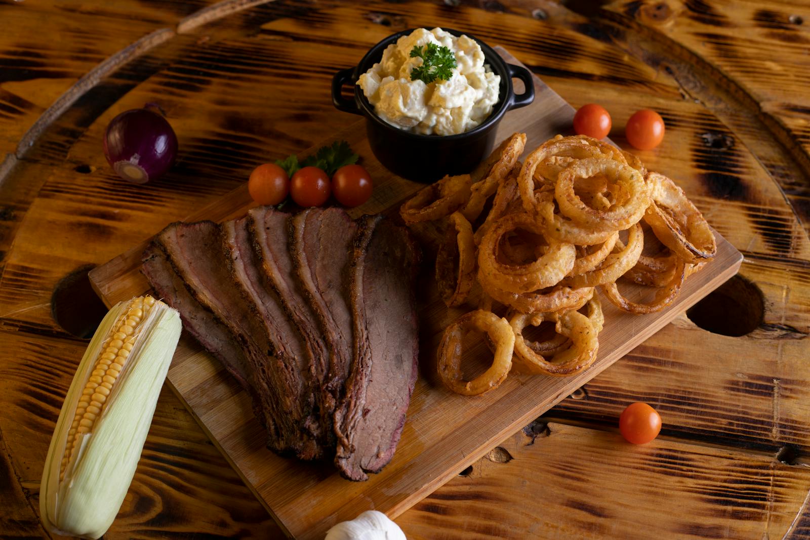 Smoked brisket platter at a top BBQ restaurant in Frisco TX
