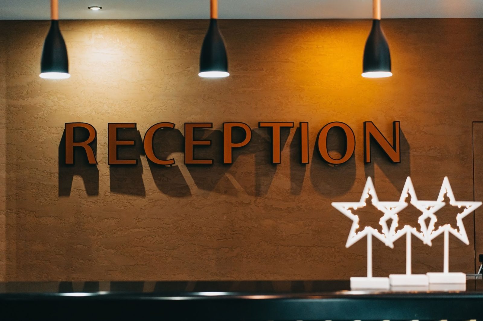 Front desk check-in at a cheap hotel in Frisco TX