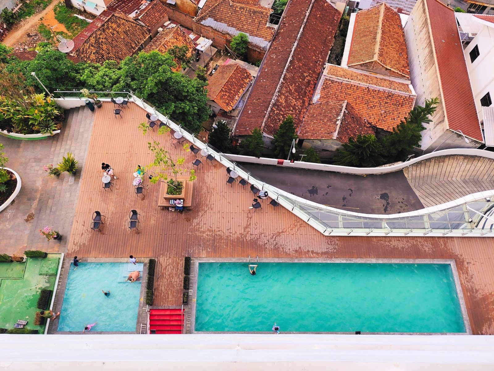 Rooftop pool deck at a Frisco hotel near The Star