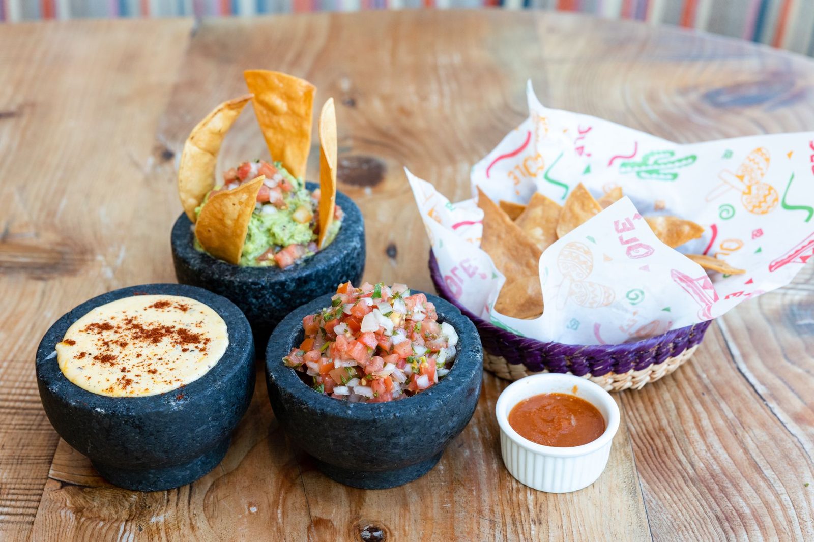 Chips, salsa, and guacamole starter at a Frisco Texas Mexican restaurant