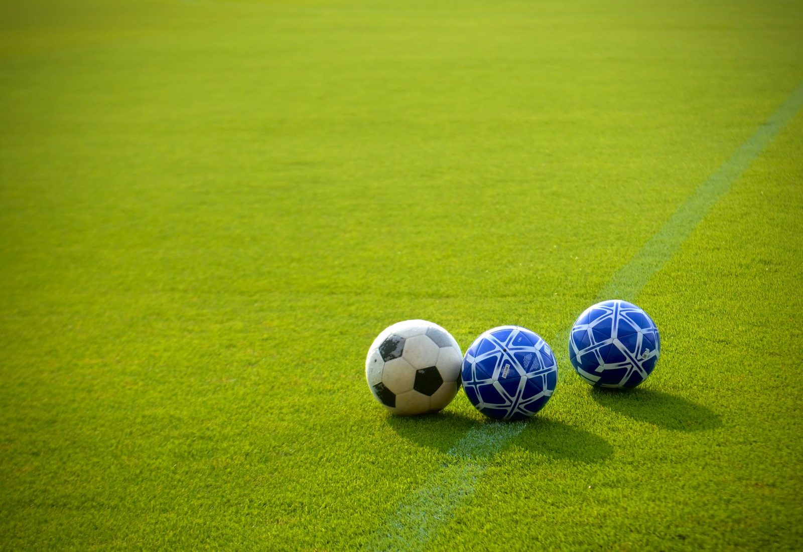 Soccer ball on the pitch before kickoff at an FC Dallas match