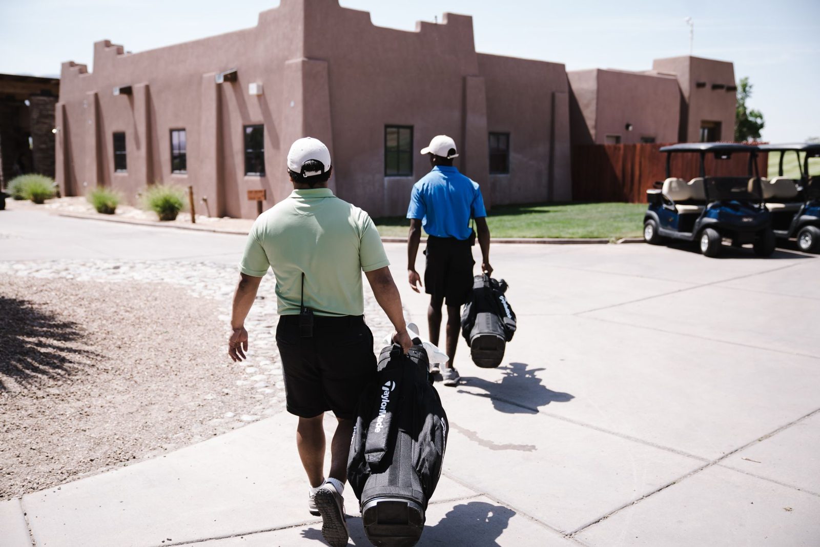 Walking with a caddie, the required way to play Fields Ranch East at PGA Frisco