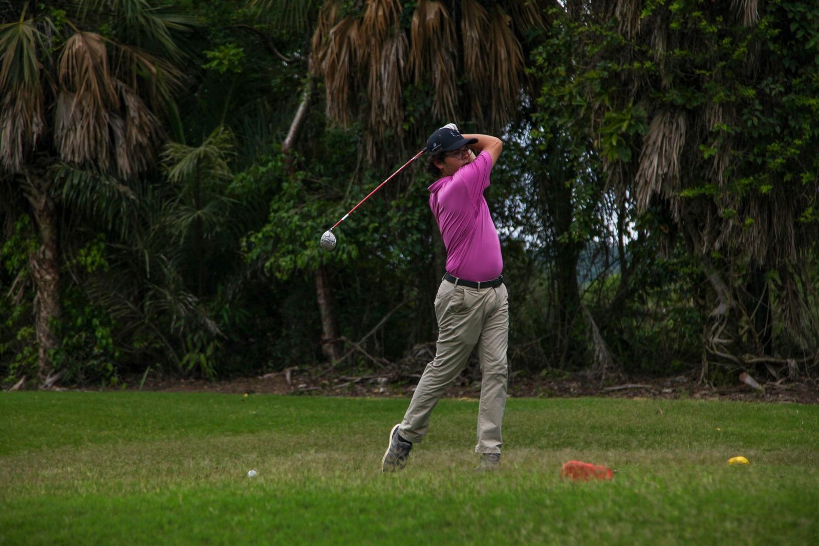 Golfer teeing off at PGA Frisco