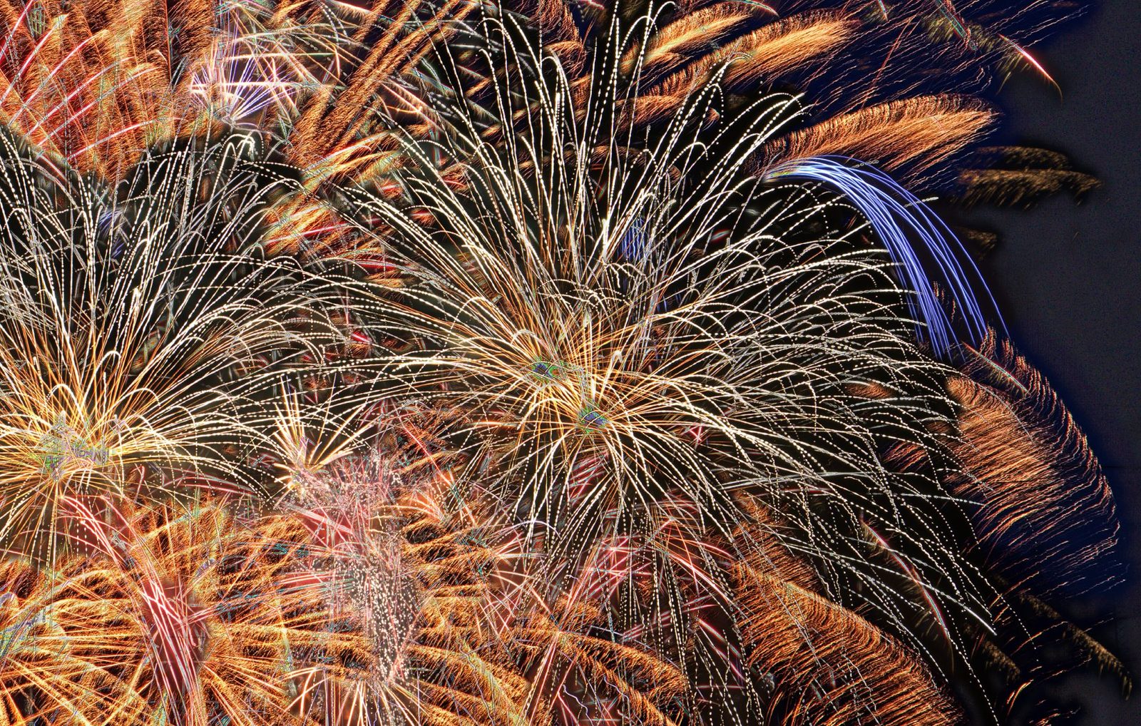 Fireworks over a stadium representing the Frisco Freedom Fest fireworks extravaganza