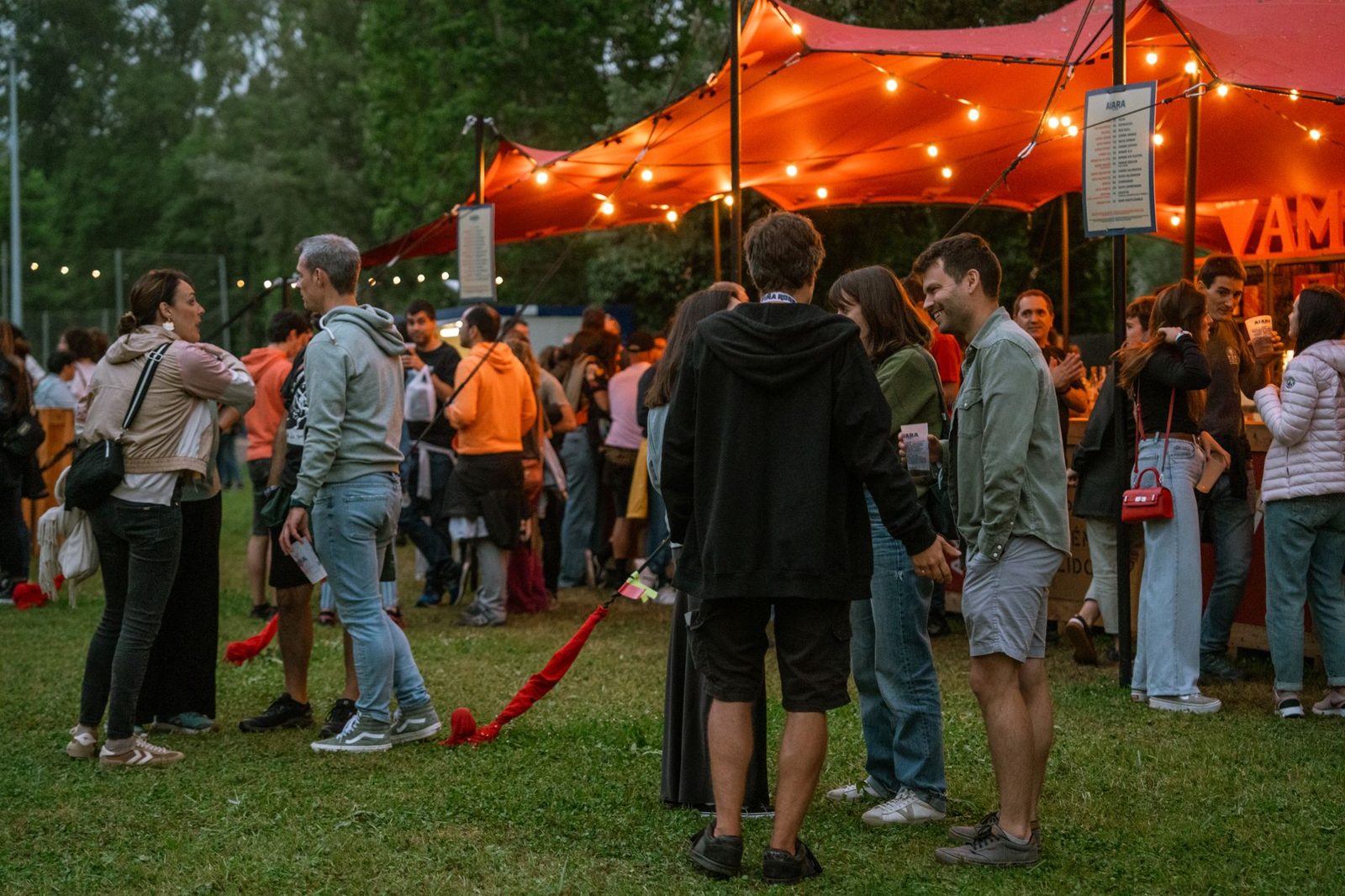 Crowd enjoying an outdoor festival representing Frisco TX events year-round