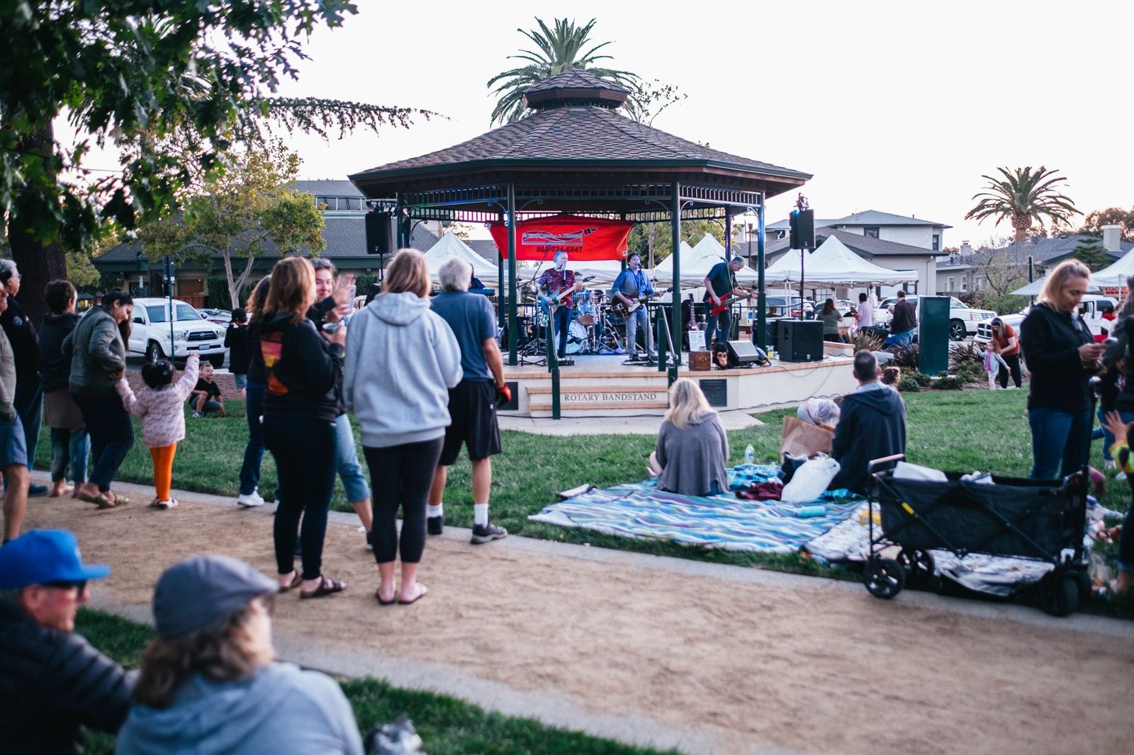 Free outdoor concert on a park lawn in Frisco TX on a weekend evening