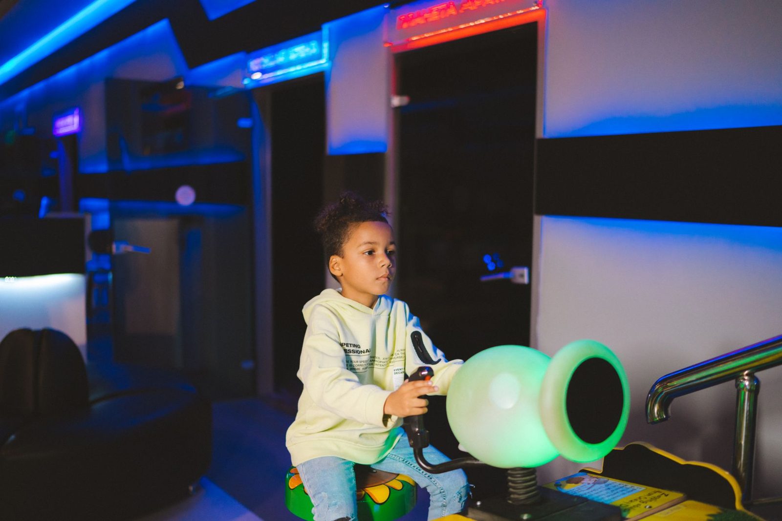 kids playing arcade games, a rainy day activity in Frisco TX