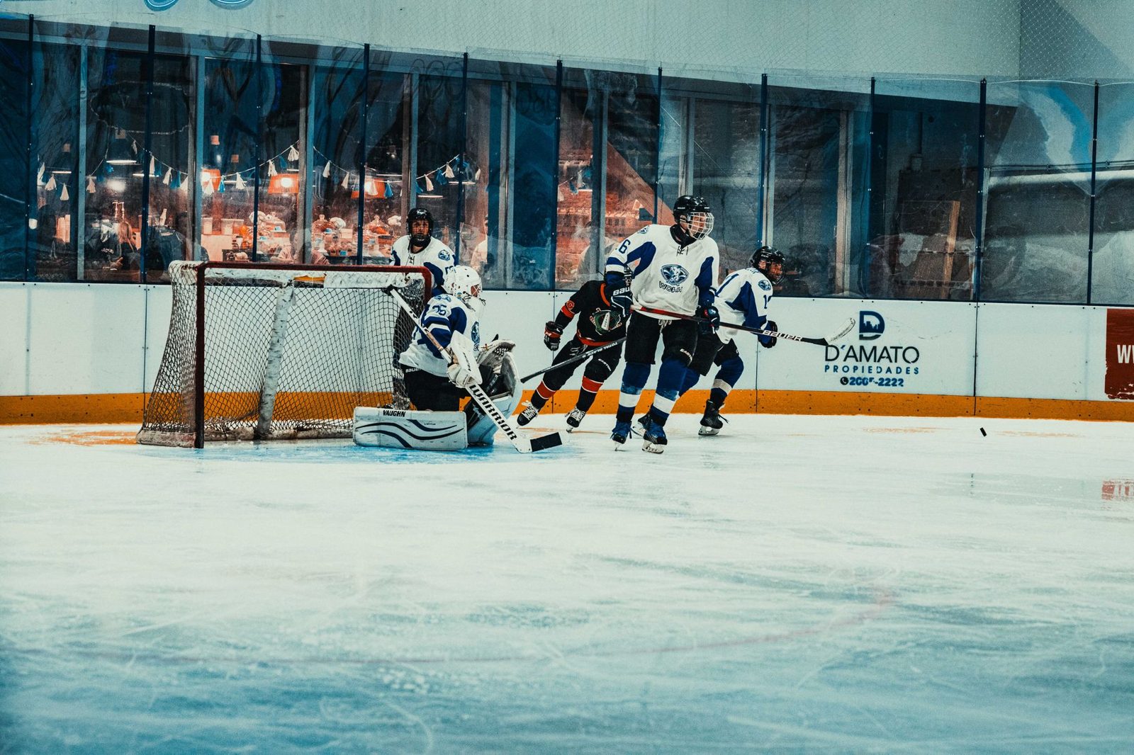 youth hockey players in action, part of the Dallas Stars youth hockey programs in Frisco TX