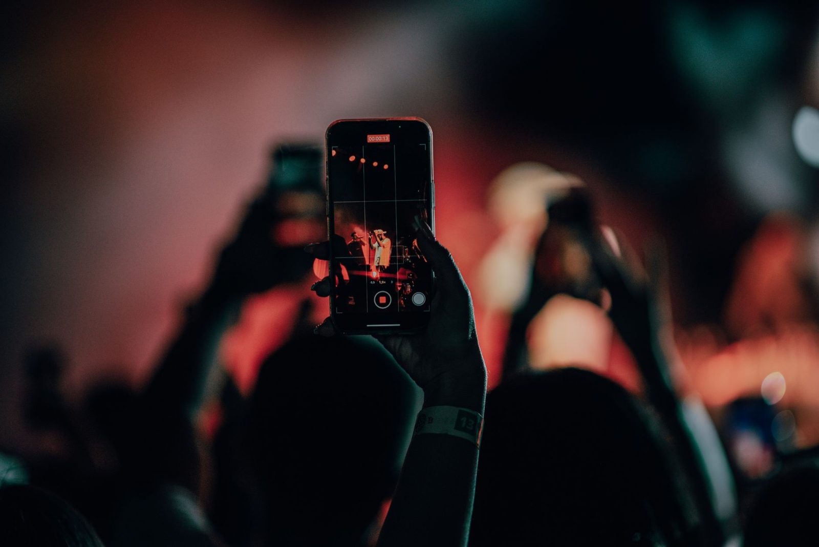 Buying tickets on a phone for concerts Frisco TX fans plan around