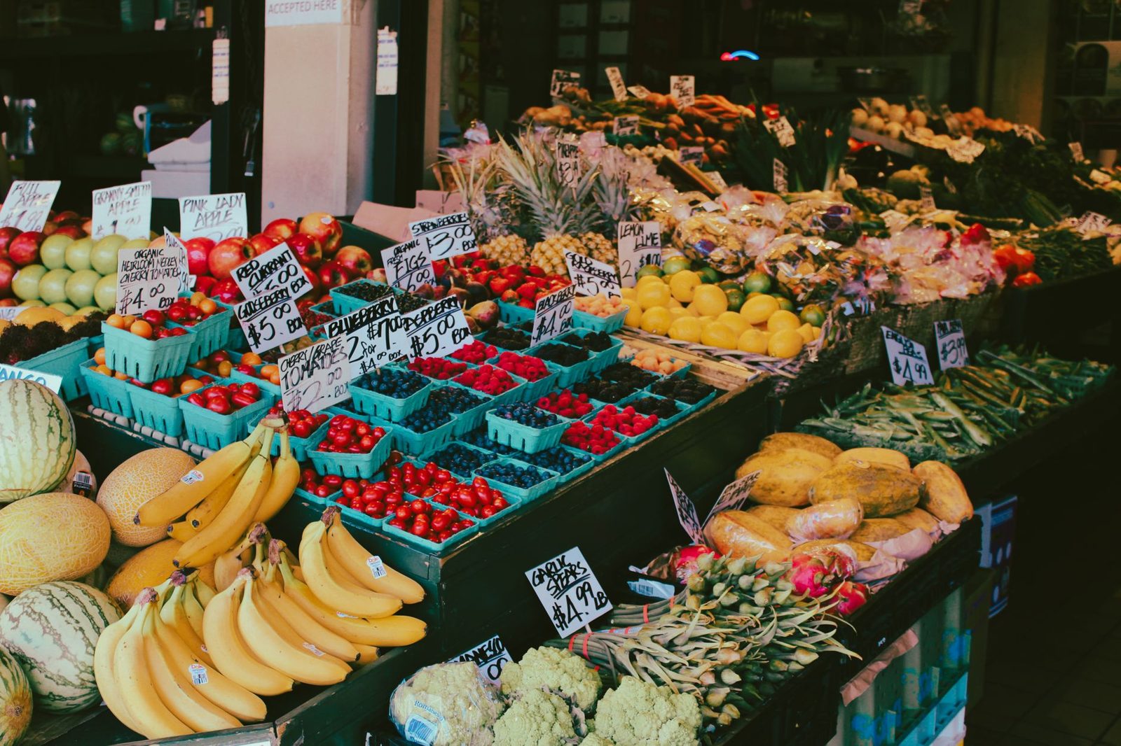 Fresh produce vendor stand at a Texas farmers market
