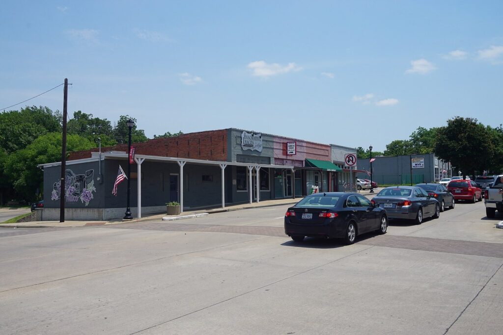 Historic Main Street storefronts in the Rail District, a free stop on a romantic getaway in Frisco TX
