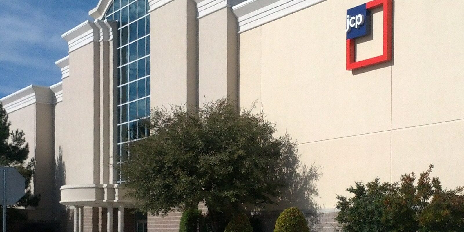 JCPenney entrance at Stonebriar Centre in Frisco with trees and landscaped beds