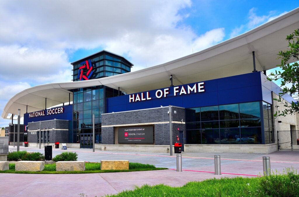 National Soccer Hall of Fame building at Toyota Stadium under a blue sky
