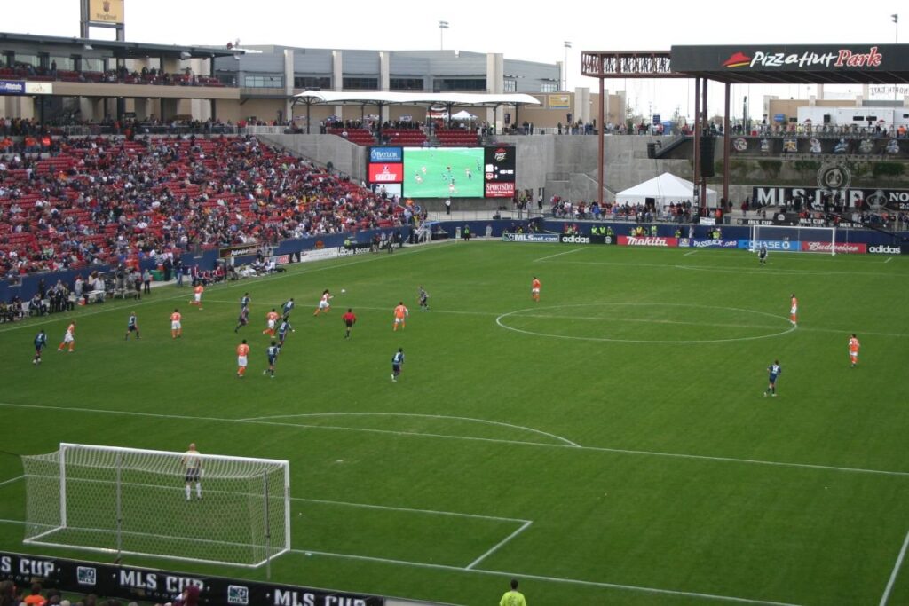 Players and a packed stand during the 2006 MLS Cup final at Pizza Hut Park