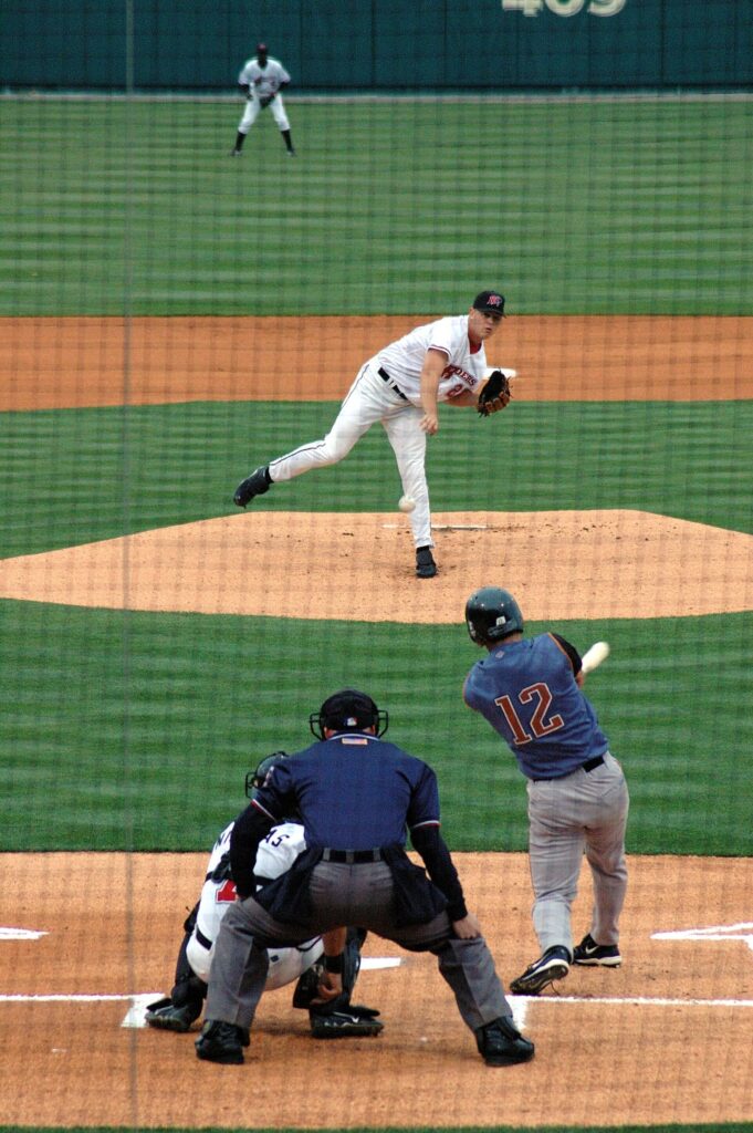 RoughRiders pitcher throwing to a Tulsa batter at the Frisco ballpark now called Riders Field