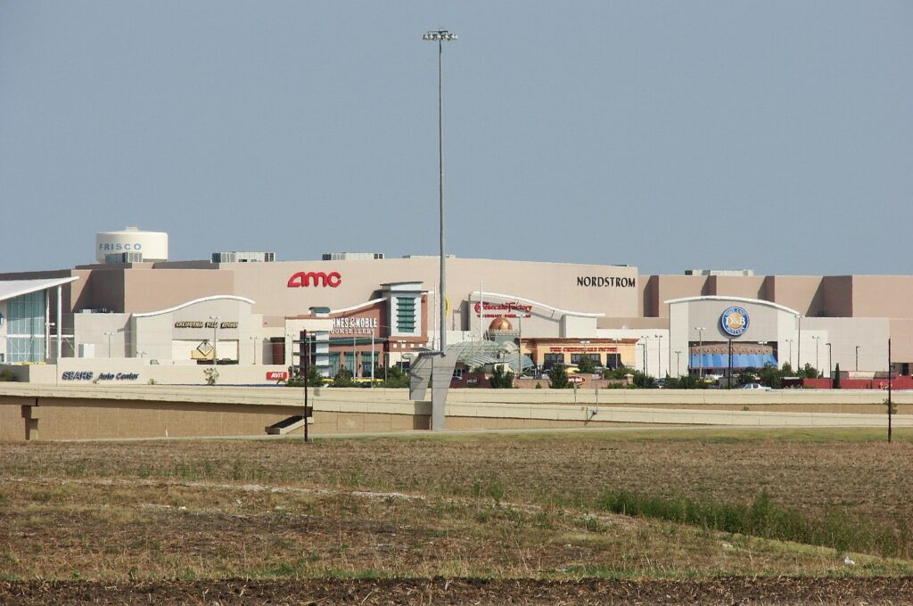 Stonebriar Centre exterior with the AMC sign, home to one of the movie theaters in Frisco TX