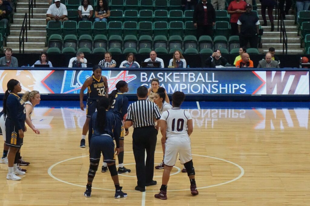 Women's college basketball tip-off on the court at Comerica Center in Frisco